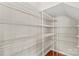 Spacious walk-in closet with ample shelving for organized storage at 18339 The Commons Blvd, Cornelius, NC 28031
