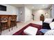 Finished basement with an entertainment area, bar, and neutral tones at 1839 Shumard Ln, Charlotte, NC 28205