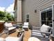 Inviting outdoor deck with wicker seating, perfect for entertaining and enjoying the outdoors at 1839 Shumard Ln, Charlotte, NC 28205
