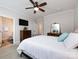 Inviting main bedroom featuring a comfortable bed, dresser, and a connected bathroom for added convenience at 1839 Shumard Ln, Charlotte, NC 28205