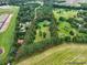 Sprawling estate boasts a large pool, mature trees and a partially wooded lot at 1878 Pl Propst Rd, Maiden, NC 28650
