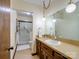This bathroom has a single vanity with a large mirror, complemented by a shower at 1878 Pl Propst Rd, Maiden, NC 28650