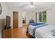 Bedroom features hardwood floors, natural light, and calming color scheme at 1878 Pl Propst Rd, Maiden, NC 28650