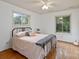 Bright bedroom features windows and hardwood floors, creating a cozy and inviting space at 1878 Pl Propst Rd, Maiden, NC 28650