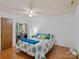 This bedroom features a bed and a desk area, providing a comfortable and functional space at 1878 Pl Propst Rd, Maiden, NC 28650