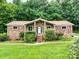 Classic brick ranch with meticulous landscaping and a welcoming entrance at 1878 Pl Propst Rd, Maiden, NC 28650