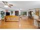 Inviting living room features a classic brick fireplace and hardwood flooring at 1878 Pl Propst Rd, Maiden, NC 28650