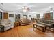 Spacious living room features hardwood floors, neutral paint, and a cozy seating arrangement at 1878 Pl Propst Rd, Maiden, NC 28650