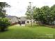 Spacious backyard with mature trees, gazebo, patio and fire pit is perfect for entertaining at 2018 Rosewater Ln, Indian Trail, NC 28079