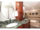 Dual vanity in bathroom with granite countertop and undermount sinks, plus garden tub at 2018 Rosewater Ln, Indian Trail, NC 28079