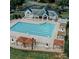 Beautiful community pool with lap lanes, seating, and shade structures, perfect for relaxation at 2018 Rosewater Ln, Indian Trail, NC 28079