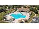 Aerial view of the sparkling community pool with ample seating and fun water features at 2018 Rosewater Ln, Indian Trail, NC 28079