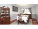 Formal dining room with classic furnishings, a chandelier, and a decorative hutch at 2018 Rosewater Ln, Indian Trail, NC 28079