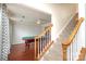 Spacious game room featuring a pool table, hardwood floors, and staircase in view at 2018 Rosewater Ln, Indian Trail, NC 28079