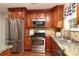 Updated kitchen with stainless steel appliances, granite countertops, and ample cabinet space for all your culinary needs at 2018 Rosewater Ln, Indian Trail, NC 28079