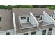 Aerial view of townhome roofs and private decks with sleek modern design with outdoor living spaces at 2653 Shenandoah Ave, Charlotte, NC 28205