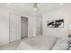 Bright bedroom includes sliding closet doors, recessed lighting, and neutral decor at 2653 Shenandoah Ave, Charlotte, NC 28205