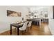 Elegant dining area adjacent to a modern kitchen with stainless steel appliances and counter seating at 2653 Shenandoah Ave, Charlotte, NC 28205
