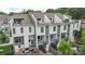 Modern townhome exterior showcasing balconies, spiral staircases, and gray and white color scheme at 2653 Shenandoah Ave, Charlotte, NC 28205
