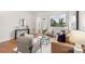 Inviting living room with hardwood floors, comfortable seating, and plenty of natural light at 2653 Shenandoah Ave, Charlotte, NC 28205