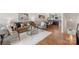Cozy living room with hardwood floors, stylish decor, and an open layout flowing into the dining area at 2653 Shenandoah Ave, Charlotte, NC 28205