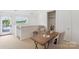 Bright office space with a large window and modern desk at 2653 Shenandoah Ave, Charlotte, NC 28205