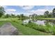 Calm pond surrounded by lush greenery on a sunny day at 2653 Shenandoah Ave, Charlotte, NC 28205
