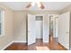 Cozy bedroom with hardwood floors and closet space at 2701 Ravencroft Dr, Charlotte, NC 28208