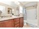 Bathroom with granite countertops, double sinks, and shower-tub combo at 2840 Hopeton Ct, Monroe, NC 28110
