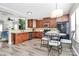 Modern kitchen with wood cabinets, stainless appliances, granite countertops and a breakfast nook at 2840 Hopeton Ct, Monroe, NC 28110