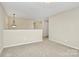 Spacious living room with neutral carpeting and ample natural light at 2840 Hopeton Ct, Monroe, NC 28110