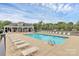 Community pool with lounge chairs and covered pavilion in a well-maintained neighborhood at 2840 Hopeton Ct, Monroe, NC 28110