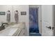 The bathroom includes marble countertops and a distinctive space-themed shower curtain at 3011 Waxhaw Crossing Dr, Waxhaw, NC 28173