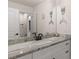 Bright bathroom features a marble countertop and a unique mermaid decor at 3011 Waxhaw Crossing Dr, Waxhaw, NC 28173