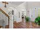 Bright two-story foyer with wood floors, an arched entryway, and an abundance of natural light at 3011 Waxhaw Crossing Dr, Waxhaw, NC 28173