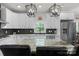 Modern kitchen with white cabinets, granite countertops, and stainless steel appliances at 3011 Waxhaw Crossing Dr, Waxhaw, NC 28173