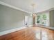 Hardwood floors and vintage lighting fixture in dining room at 308 W Monroe St, Salisbury, NC 28144