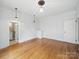 Sunlit living room featuring hardwood floors, neutral walls, and modern recessed lighting at 308 W Monroe St, Salisbury, NC 28144