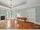 Bright living room with hardwood floors, fireplace, and natural light at 308 W Monroe St, Salisbury, NC 28144