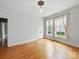 Bright living room featuring hardwood floors, and a large window with views of the outdoors at 308 W Monroe St, Salisbury, NC 28144