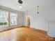 Cozy living room with hardwood flooring, neutral walls, and bright natural light at 308 W Monroe St, Salisbury, NC 28144