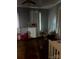 Bright bedroom with ample natural light, featuring hardwood floors and neutral decor at 325 N Caldwell Ave, Newton, NC 28658