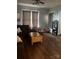 Inviting living room featuring hardwood floors and natural light from the large windows at 325 N Caldwell Ave, Newton, NC 28658