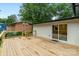 Large wooden deck with railings, perfect for outdoor enjoyment at 3326 Winterfield Pl, Charlotte, NC 28205