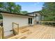 Well-built wooden deck offering views of the backyard at 3326 Winterfield Pl, Charlotte, NC 28205