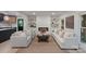 Spacious living room with modern fireplace, neutral decor, and lots of natural light at 3326 Winterfield Pl, Charlotte, NC 28205