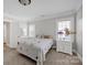 Cozy bedroom with ample natural light, perfect for relaxation and rest at 361 5Th Nw St, Hickory, NC 28601