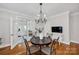 Charming dining room featuring a round table, chandelier, and french doors leading to another room at 361 5Th Nw St, Hickory, NC 28601