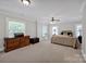 Bright main bedroom with large windows, a ceiling fan, and a spacious layout at 361 5Th Nw St, Hickory, NC 28601