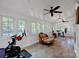 Versatile sunroom with lots of windows, perfect for workout or relaxation at 361 5Th Nw St, Hickory, NC 28601
